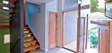 Leschi pivot entry door