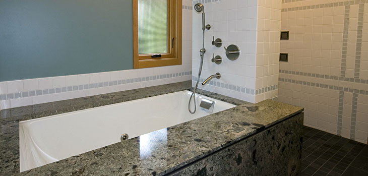 modern_bathrooms_yarrow-graniteundermount-teafortwotub